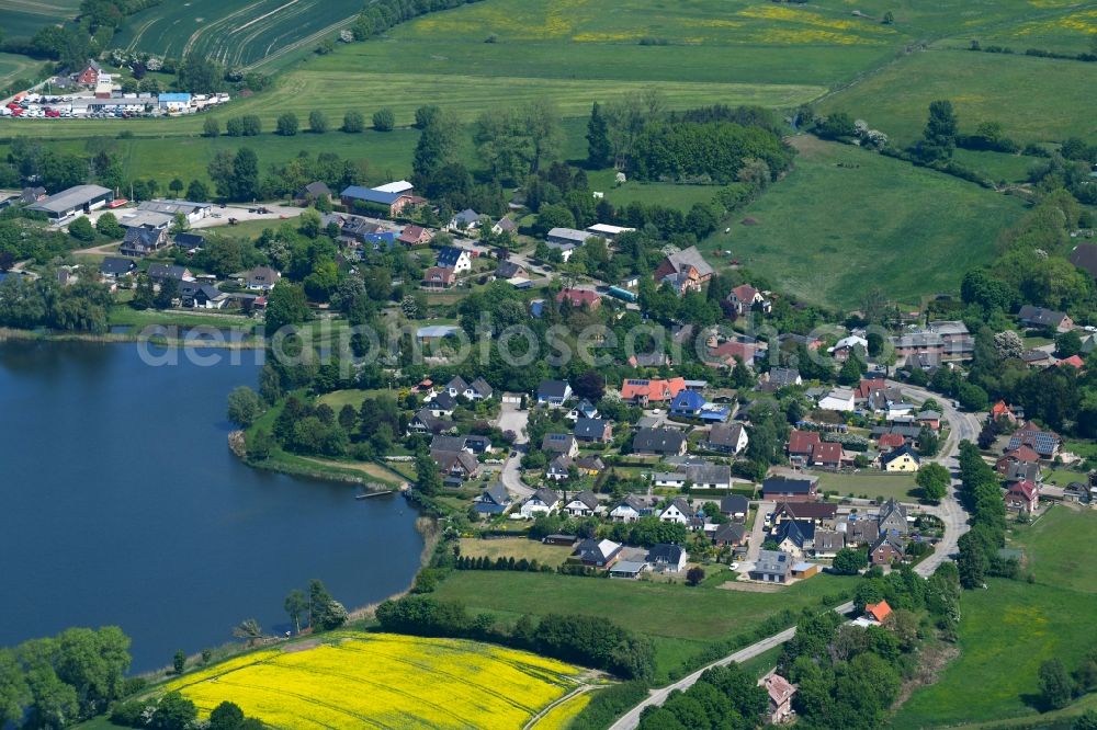 Zarpen from above - Town View of the streets and houses of the residential areas in Zarpen in the state Schleswig-Holstein, Germany