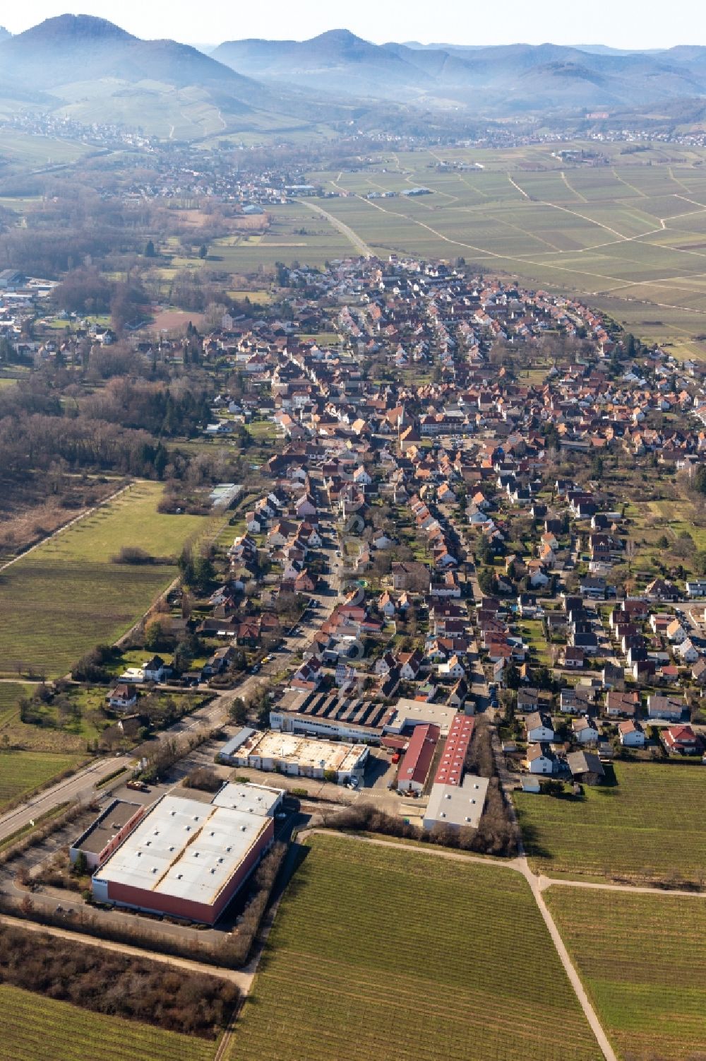 Godramstein from above - Town center on the edge of vineyards and wineries in the Palatinatewine-growing area southern vine-street in Godramstein in the state Rhineland-Palatinate, Germany