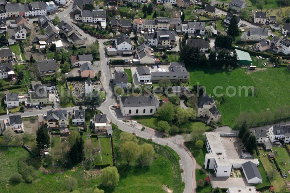 Trier Irsch from the bird's eye view: The local district Irsch with family houses, church, meadows and elementary school in Trier in Rhineland-Palatinate