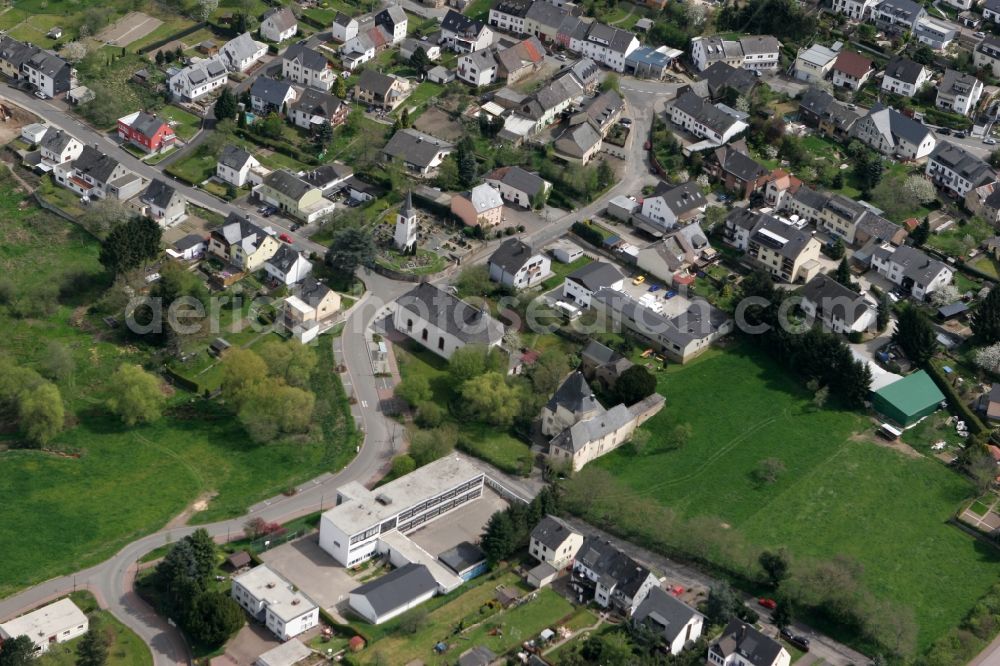 Aerial image Trier Irsch - The local district Irsch with family houses, church, meadows and elementary school in Trier in Rhineland-Palatinate