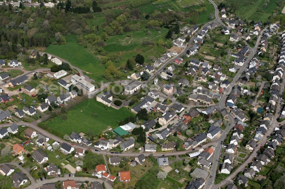 Trier Irsch from the bird's eye view: The local district Irsch with family houses, church, meadows and elementary school in Trier in Rhineland-Palatinate