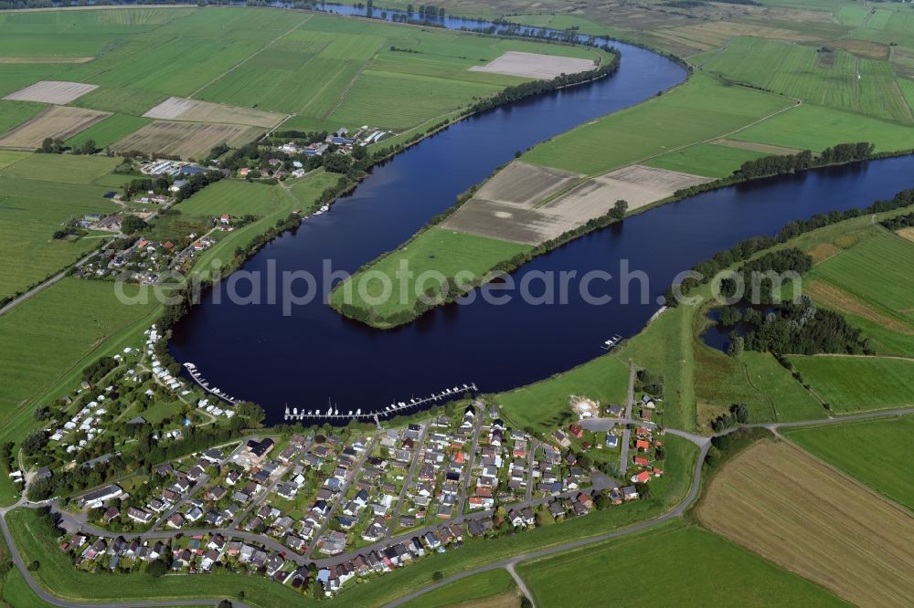 Aerial image Hennstedt - Town on the banks of the river Eider in Hennstedt in the state Schleswig-Holstein