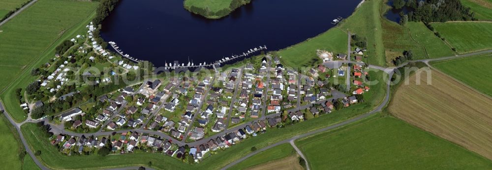 Aerial photograph Hennstedt - Town on the banks of the river Eider in Hennstedt in the state Schleswig-Holstein