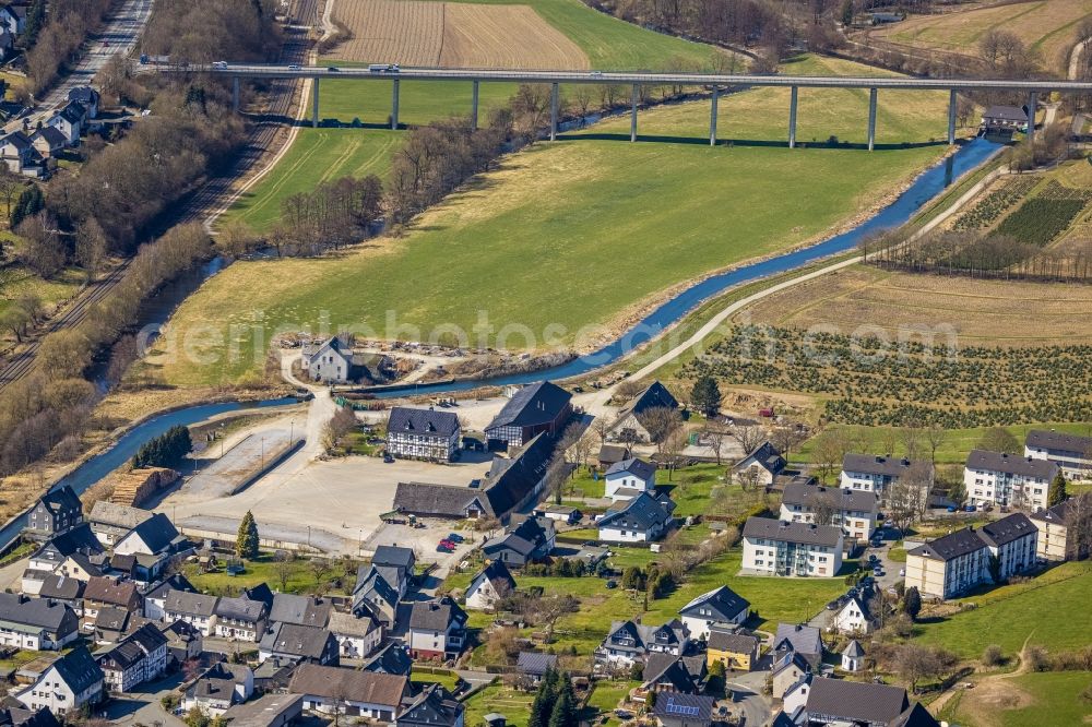 Bestwig from the bird's eye view: Town on the banks of the river of Ruhr mit Ruhrtalbruecke Velmede in Velmede at Sauerland in the state North Rhine-Westphalia, Germany