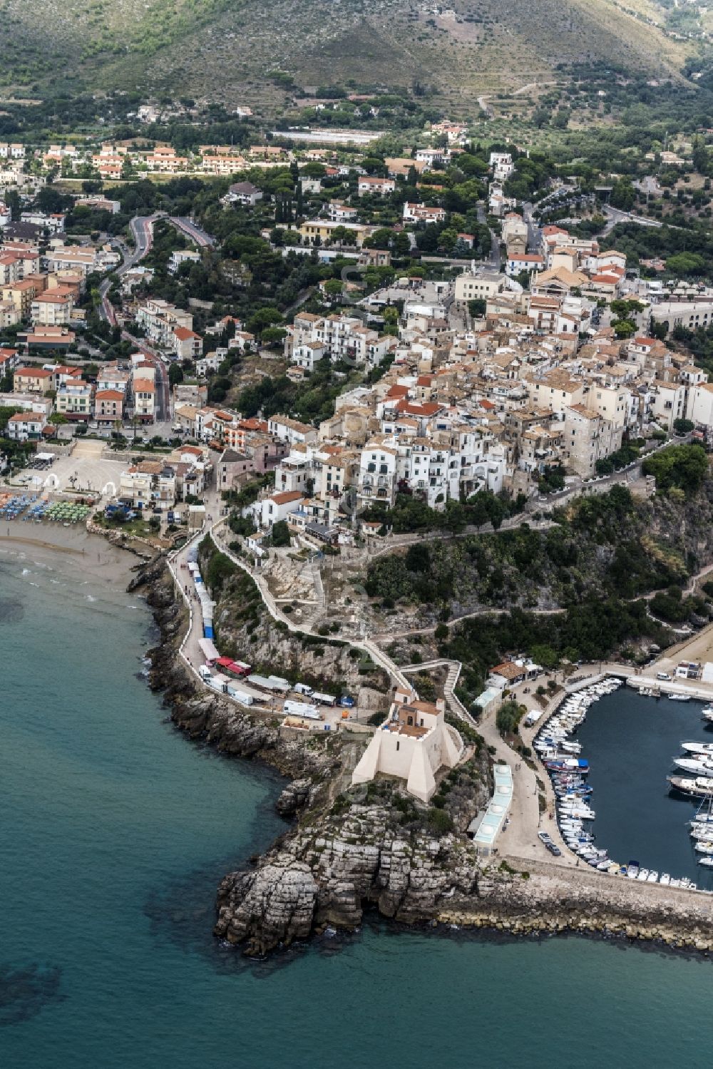 Sperlonga from the bird's eye view: Sperlonga town with the tower Torre Truglia at the yacht harbor on the Mediterranean coast in Italy