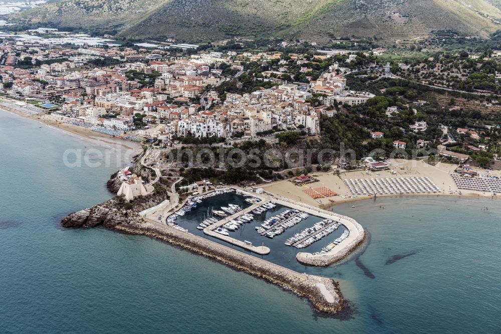 Aerial image Sperlonga - Sperlonga town with the tower Torre Truglia at the yacht harbor on the Mediterranean coast in Italy