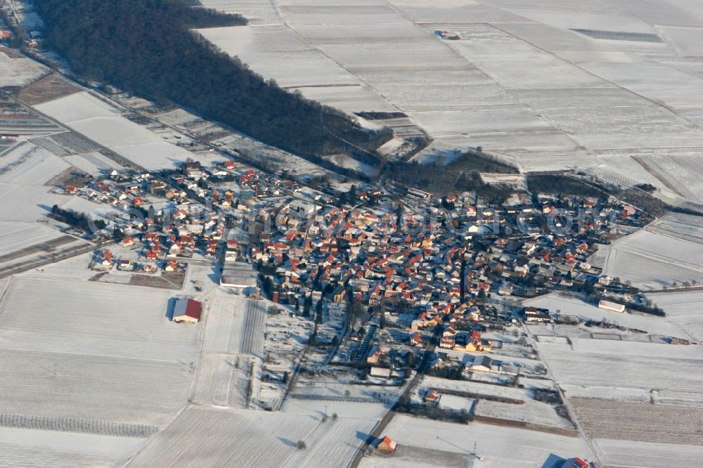 Aerial image Ober-Hilbersheim - The local village of Ober-Hilbersheim in winter. A little snowed village with surrounding snowcapped fields in the Mainz-Bingen district in Rhineland-Palatinate