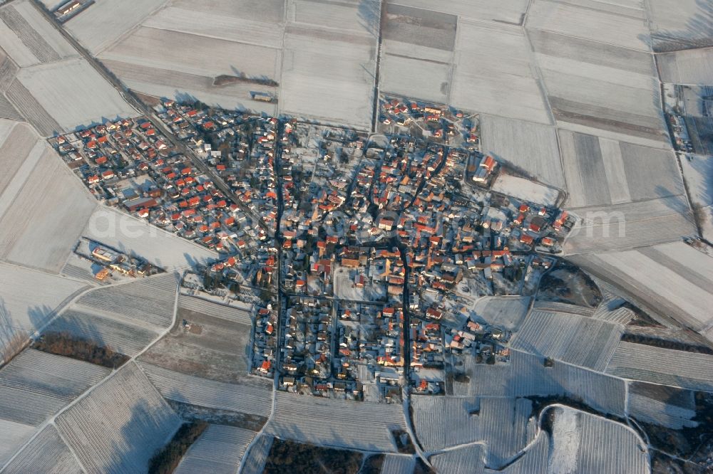 Siefersheim from above - The local community Siefersheim in winter. A contemplative snowed village with surrounding snowcapped fields in the Alzey-Worms in Rhineland-Palatinate