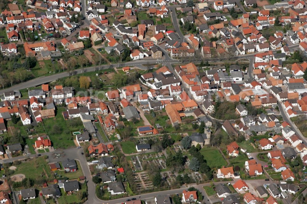 Weinsheim from above - View of the center of the small town community Weinsheim with family houses and church with cemetery along the Saarbruecker Strasse in the state of Rhineland-Palatinate