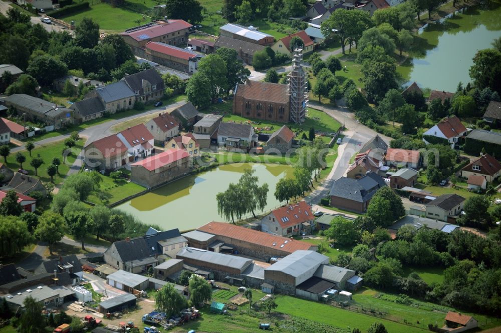 Beiersdorf-Freudenberg from above - View of the centre of the Freudenberg part of the borough of Beiersdorf-Freudenberg in the state of Brandenburg. The borough is located in the county district of Maerkisch-Oderland and consists of two parts. Freudenberg is a village around two ponds in its centre and consists of residential buildings, a church and small farm estates