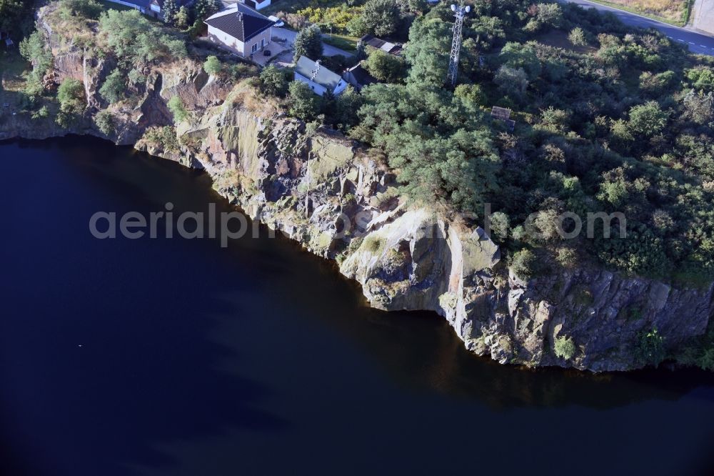 Böhlitz from the bird's eye view: Village on the banks of the area old mining lake in Boehlitz in the state Saxony