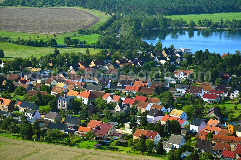 Bergwitz from above - Village on the banks of the area lake of Bergwitzsee in Bergwitz in the state Saxony-Anhalt, Germany