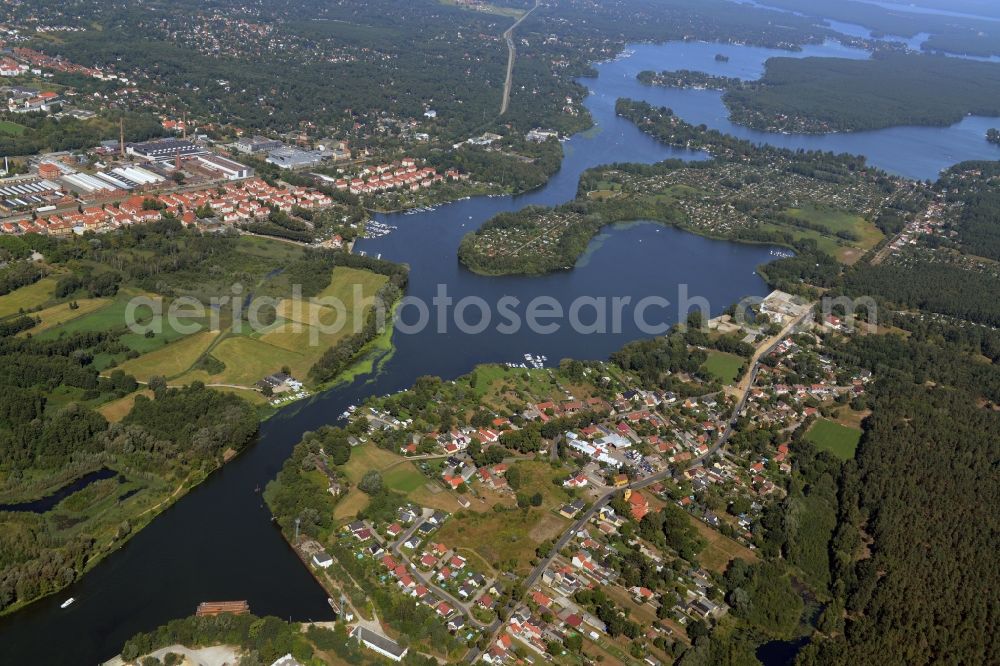 Aerial image Niederlehme - Village on the banks of the area Dahme - river course in Niederlehme in the state Brandenburg