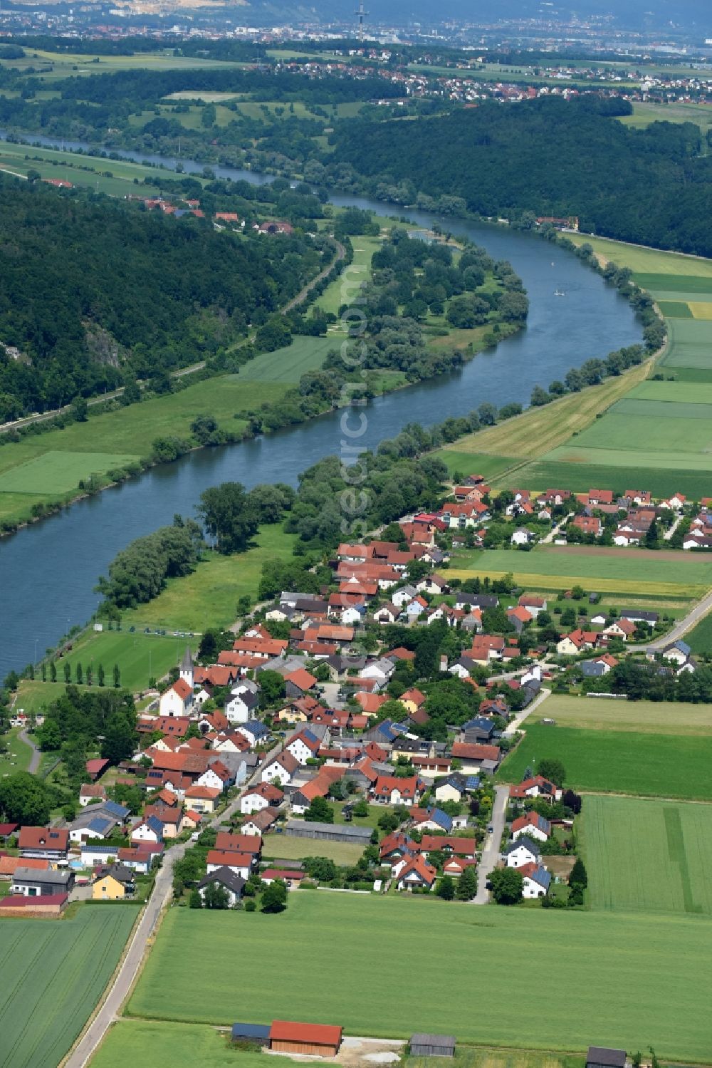 Matting from the bird's eye view: Village on the banks of the area Danube - river course in Matting in the state Bavaria, Germany