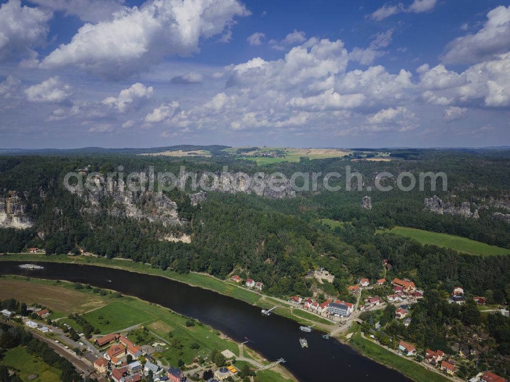 Aerial photograph Rathen - Village on the banks of the area Elbe - river course on street Trebenweg in Rathen Basteigebiet in the state Saxony, Germany