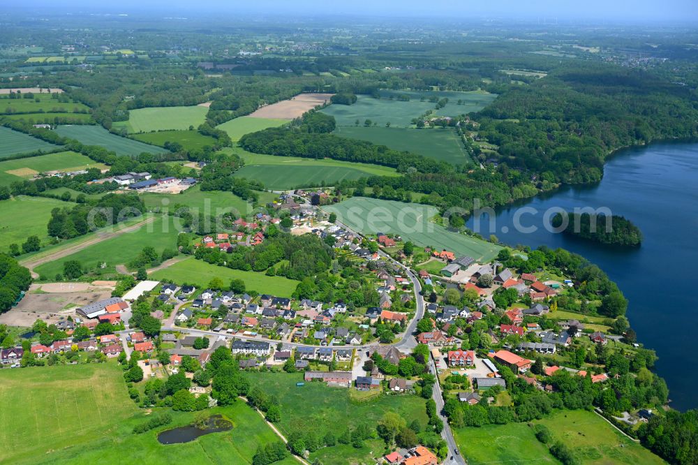 Aerial image Großensee - Village on the banks of the lake of Grossensee in Grossensee in the state Schleswig-Holstein, Germany