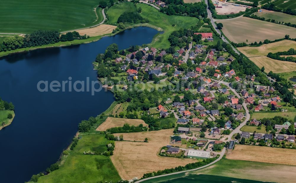 Aerial image Stoltenberg - Village on the banks of the area lake of Passader See on street Dorfstrasse in Stoltenberg in the state Schleswig-Holstein, Germany