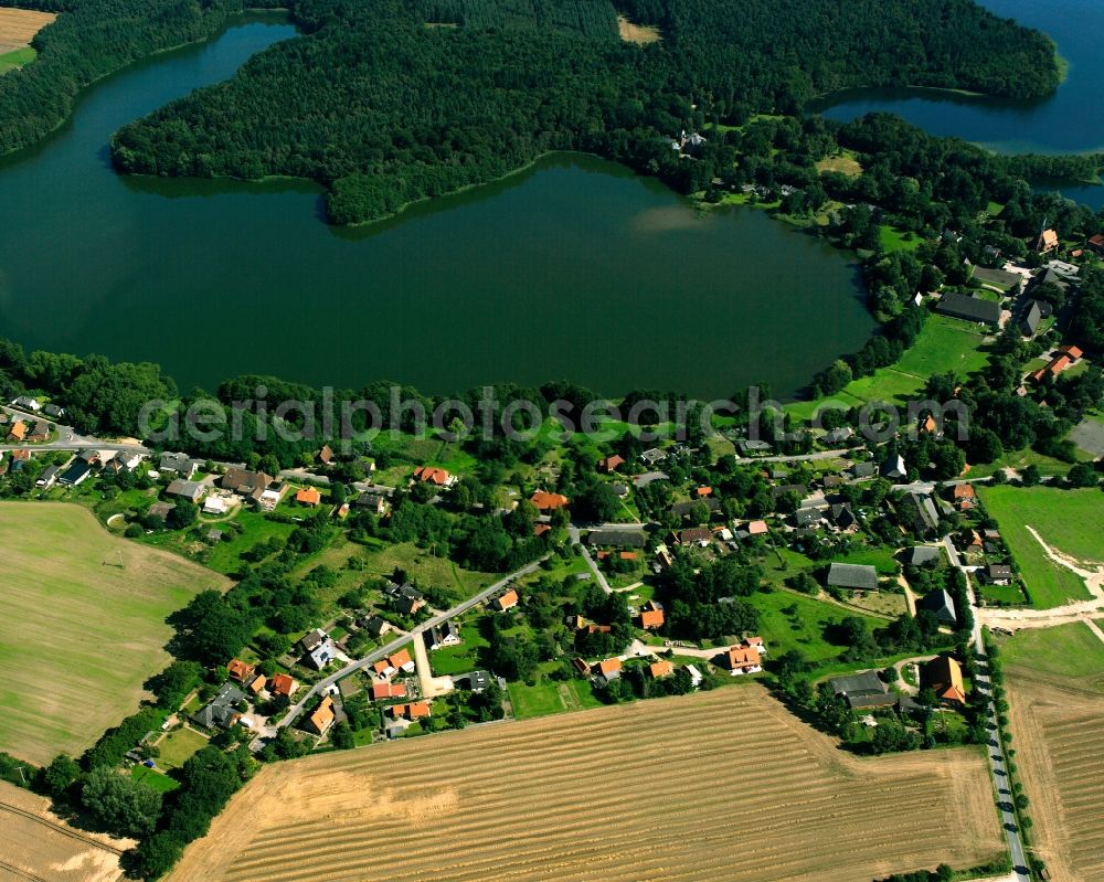 Seedorf from above - Village on the banks of the area lake on Seedorfer Kuechensee in Seedorf in the state Schleswig-Holstein, Germany