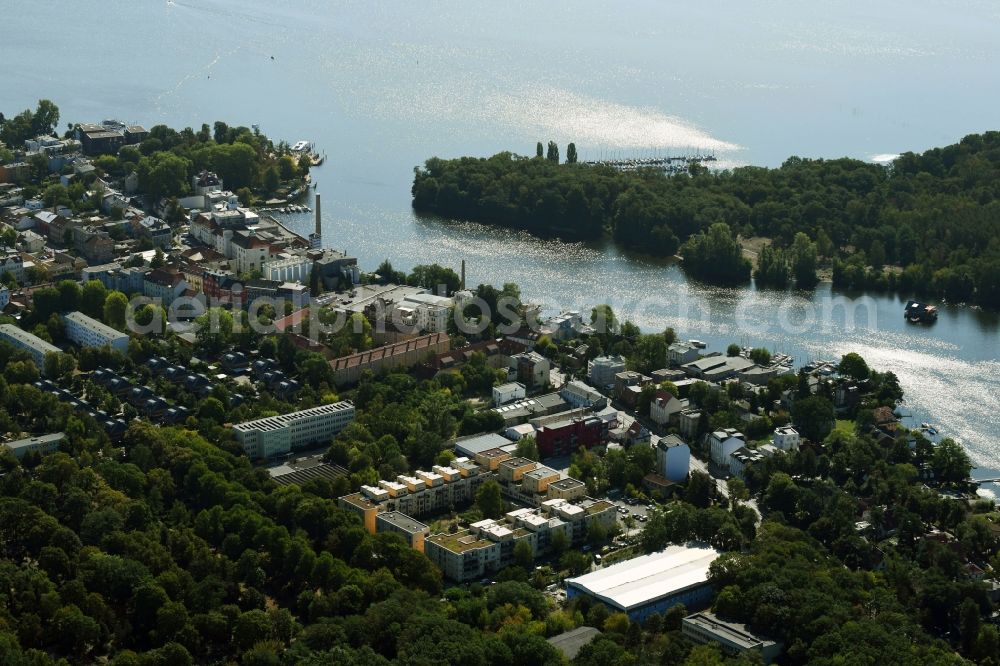 Berlin from above - Village on the banks of the area on shore of Mueggelspree - river course in Berlin, Germany