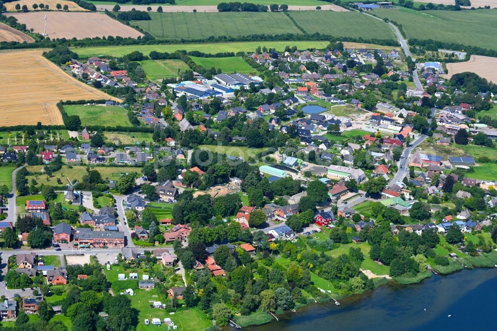 Groß Wittensee from the bird's eye view: Village on the banks of the area lake of Wittensee in Gross Wittensee in the state Schleswig-Holstein, Germany