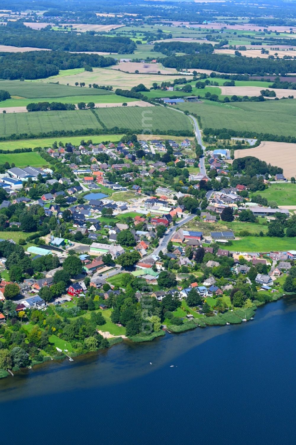 Aerial photograph Groß Wittensee - Village on the banks of the area lake of Wittensee in Gross Wittensee in the state Schleswig-Holstein, Germany