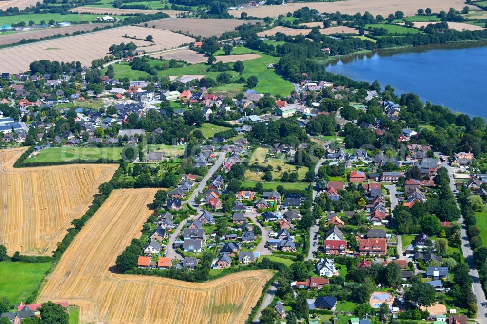 Groß Wittensee from above - Village on the banks of the area lake of Wittensee in Gross Wittensee in the state Schleswig-Holstein, Germany