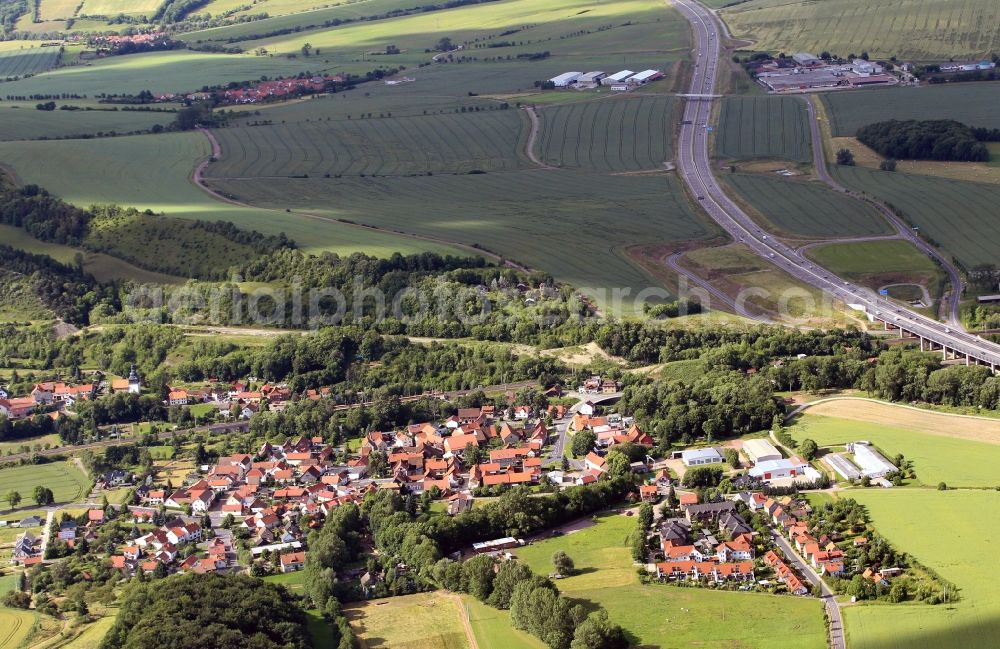 Sattelstädt from above - Sattelstaedt is a district of the municipality Hoerselberg-Hainich in Thuringia. The place is accessible via a connection point of the A4 highway. Beyond the tracks of the railway Thuringia stands the church of St. John on a slight elevation