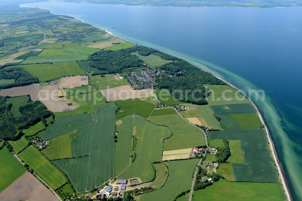 Aerial image Schwedeneck - The district Daenisch-Nienhof of the local community Schwedeneck with nearby fields at the coastline of the baltic sea in the state Schleswig-Holstein