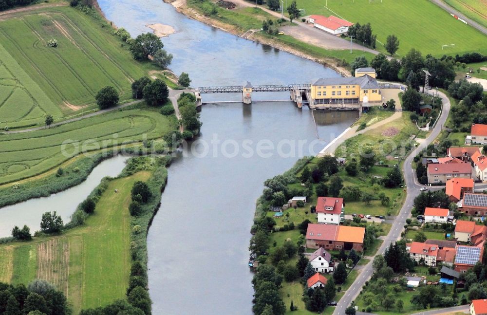 Krauthausen-Spichra from above - At the district Spichra of Krauthausen in Thuringia the Werra flows along. At the level of the village street of Spichra locks a weir the Werra. For about a hundred years here a hydroelectric power plant is operated. Today's user is the E.ON AG Thuringia