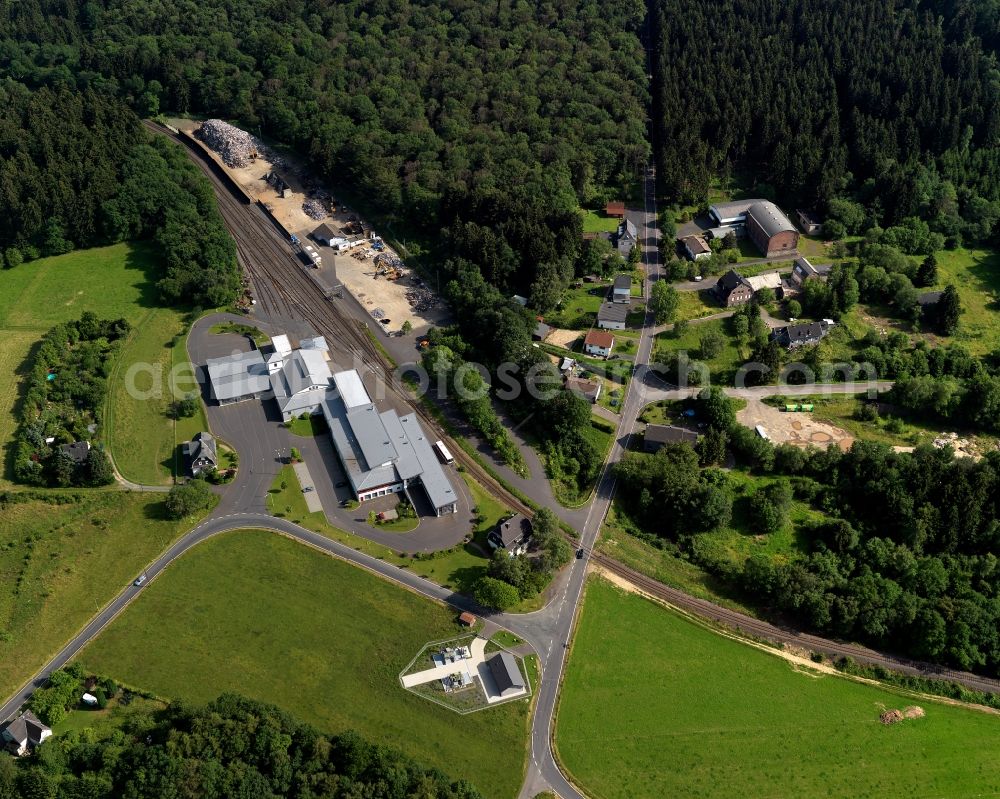 Steinebach from above - View of the Biesenstueck part of Steinebach in the state of Rhineland-Palatinate. Steinebach is located in a valley of the river Sieg. Its two parts - Bindweide and Biesenstueck - are located in the East of Steinebach. A mine is located in Bindweide, which is also open to the public. Railway tracks and a train station can be seen here