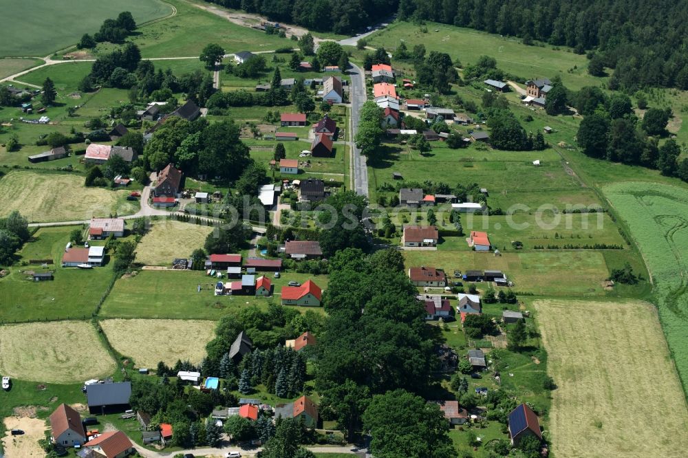 Aerial photograph Schwarz - View of the village of Buschhof in the county of Schwarz in the state of Mecklenburg - Western Pomerania. The village is surrounded by fields and located on the edge of a forest and along Wittstocker Strasse, the L25