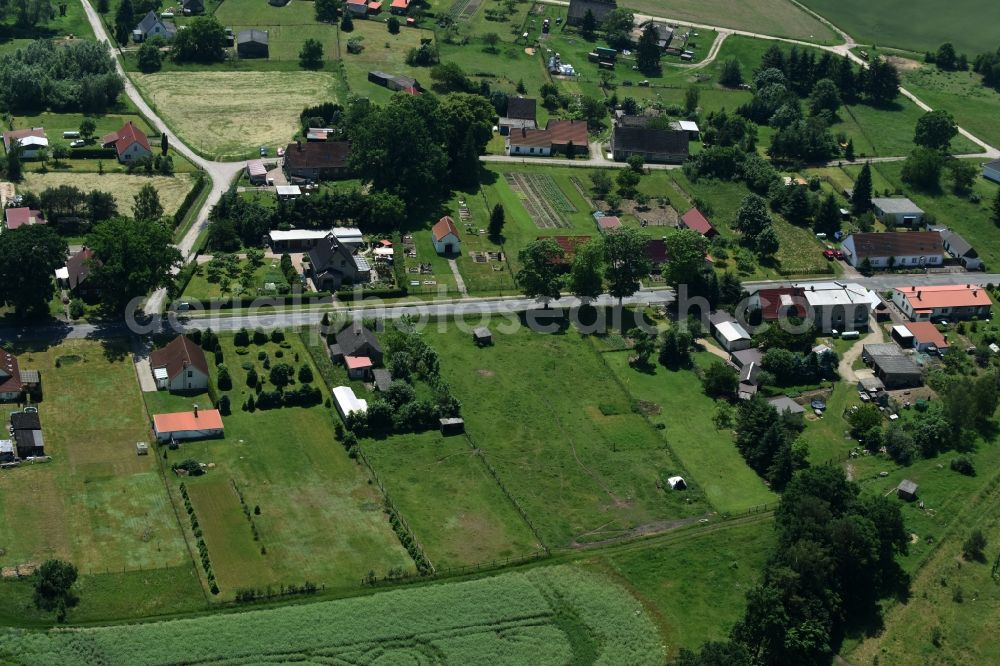 Aerial image Schwarz - View of the village of Buschhof in the county of Schwarz in the state of Mecklenburg - Western Pomerania. The village is surrounded by fields and located on the edge of a forest and along Wittstocker Strasse, the L25