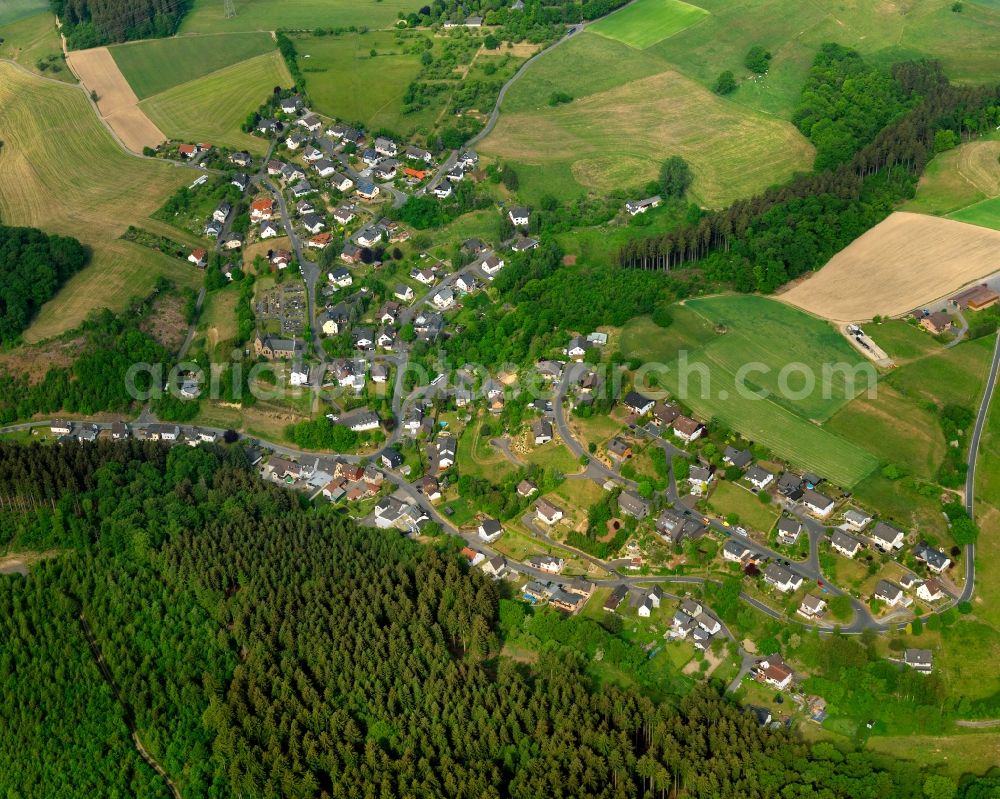 Aerial photograph Katzwinkel (Sieg) - View of the Elkhausen part of Katzwinkel in the state of Rhineland-Palatinate. The municipiality and borough is an official tourist resort and consists of several residential areas and agricultural businesses and land. It is surrounded by forest and hills. Elkhausen is located in its West