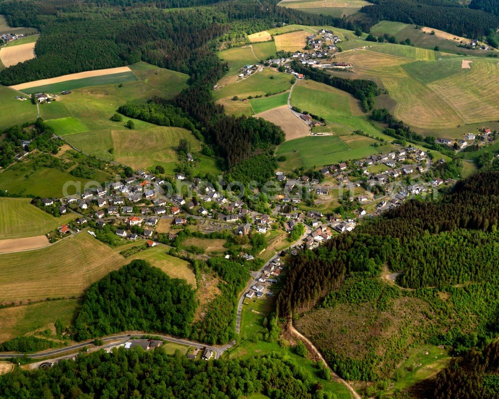 Katzwinkel (Sieg) from the bird's eye view: View of the Elkhausen part of Katzwinkel in the state of Rhineland-Palatinate. The municipiality and borough is an official tourist resort and consists of several residential areas and agricultural businesses and land. It is surrounded by forest and hills. Elkhausen is located in its West