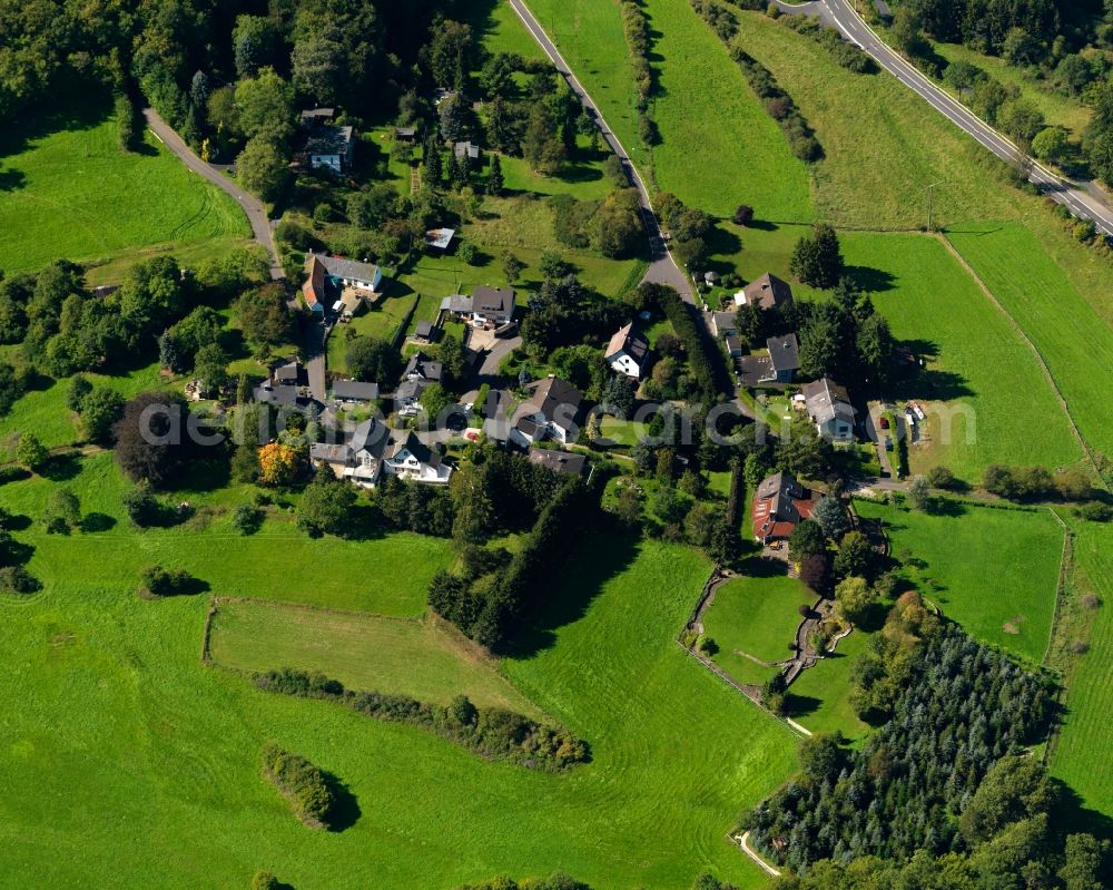 Bermel from above - View of the Fensterseifen part of Bermel in the state of Rhineland-Palatinate. The borough and municipiality of Bermel is located in the county district of Mayen-Koblenz in the East Eifel region. Bermel is surrounded by agricultural land and meadows and borders the Elzbach creek in the North. A large part of the municipial area is covered in woods and forest