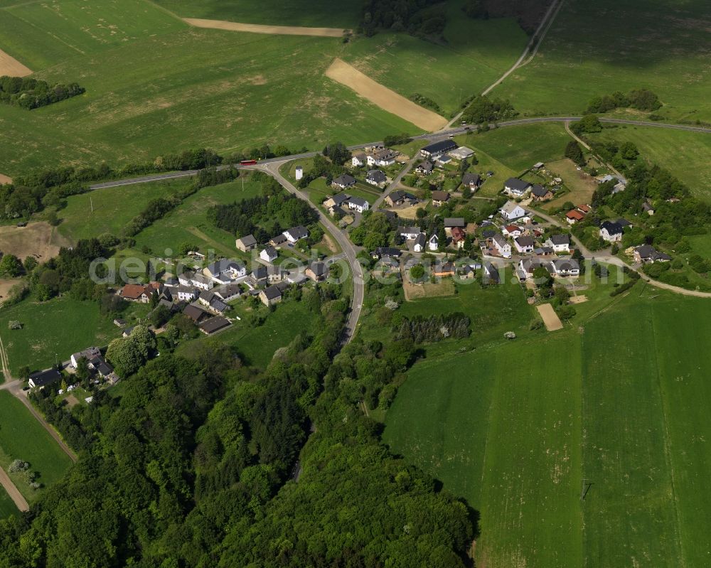 Spessart from the bird's eye view: View of the Hannebach part of the borough of Spessart in the state of Rhineland-Palatinate. The borough is surrounded by fields, agricultural land and forest and mainly consists of residential buildings and agricultural businesses or farms