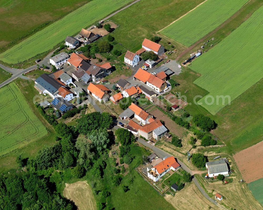 Aerial photograph Abtweiler - View of the Huehnerhof part of the borough and municipiality of Abtweiler in the state of Rhineland-Palatinate. The agricultural borough is located in the county district of Bad Kreuznach. Surrounded by fields, hills and forest, the village is located in the mountain range of Northern Palatinate