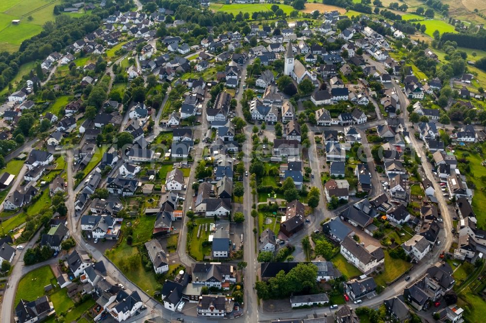 Aerial image Warstein - View of the Hirschberg part of the town of Warstein in the state of North Rhine-Westphalia. The village is located in the county district of Soest, in the West of the town and consists of historic residential buildings