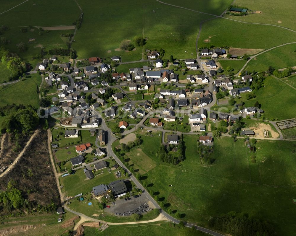 Aerial photograph Kaltenborn - View of the Jammelshofen part of the borough of Kaltenborn in the state of Rhineland-Palatinate. Kaltenborn is located in the centre of the Hocheifel region in the foothills of the Hohe Acht, the highest mountain range of the region. View of the centre of the borough with residential areas, agricultural land and farms, surrounded by forest and hills. Jammelshofen is located in its South