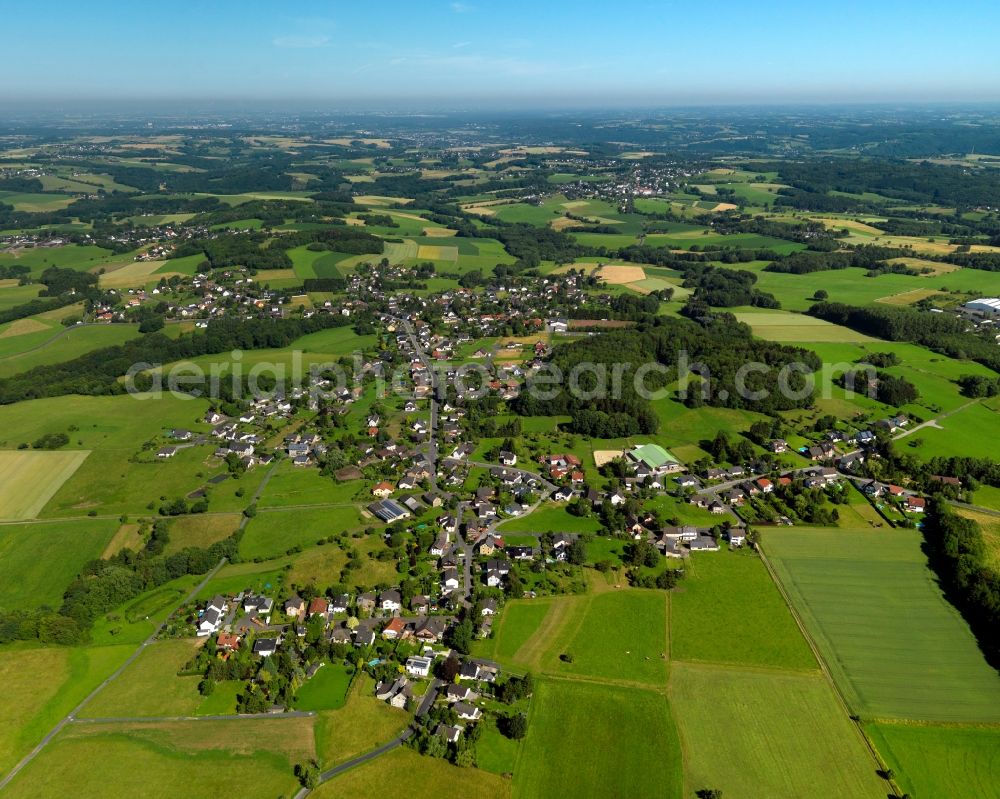 Buchholz from above - View of the Jungeroth part of Buchholz in the state of Rhineland-Palatinate. The borough and municipiality Buchholz is located in the county district of Neuwied on the edge of the Westerwald forest region and surrounded by fields, meadows and hills. Jungeroth is located in the Northwest of the core village