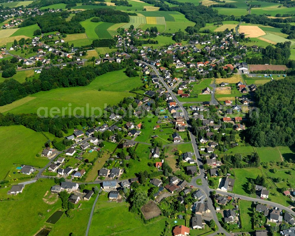 Buchholz from the bird's eye view: View of the Jungeroth part of Buchholz in the state of Rhineland-Palatinate. The borough and municipiality Buchholz is located in the county district of Neuwied on the edge of the Westerwald forest region and surrounded by fields, meadows and hills. Jungeroth is located in the Northwest of the core village on a wooded hill