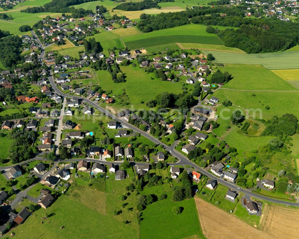 Buchholz from the bird's eye view: View of the Koelsch-Buellesbach part of Buchholz in the state of Rhineland-Palatinate. The borough and municipiality Buchholz is located in the county district of Neuwied on the edge of the Westerwald forest region and surrounded by fields, meadows and hills. Koelsch-Buellesbach is located in the North of the core village