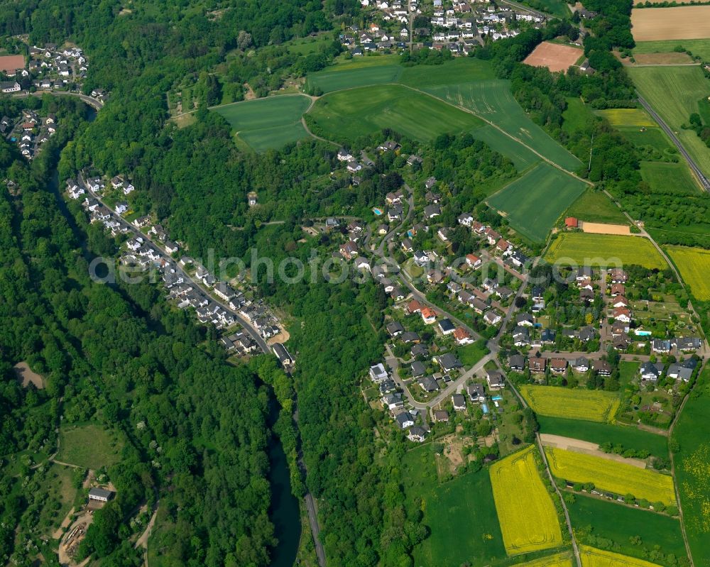 Neuwied from above - View of the hamlet of Kuemmelberg in Melsbach in the state of Rhineland-Palatinate. The borough and municipiality is located in the county district of Neuwied, in the foothills of the Westerwald forest, in the Nature Park Rhine-Westerwald and in the area of the Neuwieder Becken. It consists of several single family houses and residential areas and is a rural locality. Kuemmelberg is located in its South