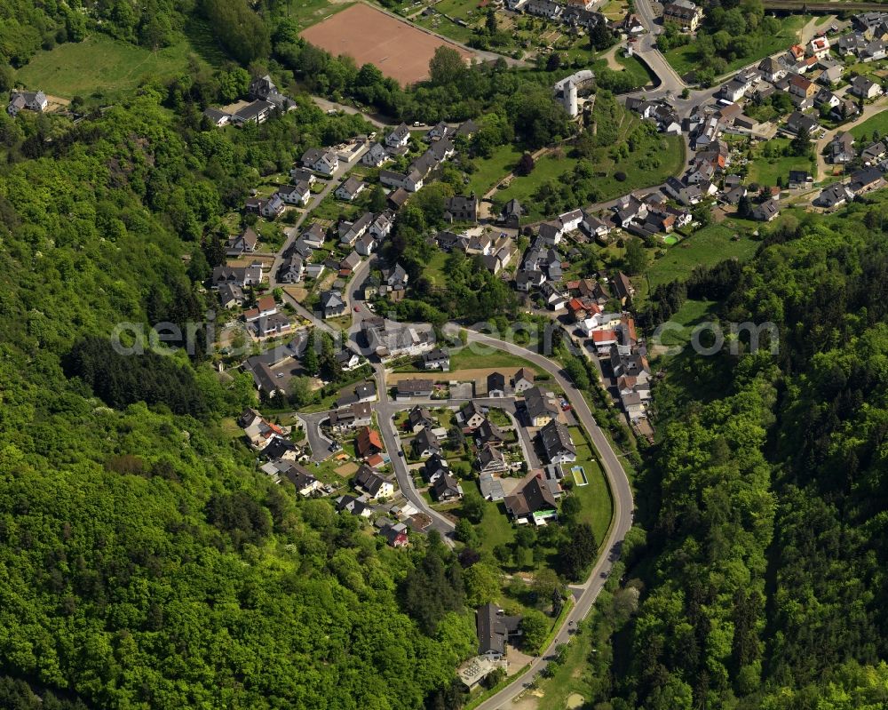 Altenahr from above - View of the Kreuzberg part of Altenahr in the state of Rhineland-Palatinate. Sporting grounds and a football pitch are spread out on the riverbanks of the river Ahr. Altenahr is an official tourist resort and consists of four parts with diverse leisure and tourism facilities and residential areas