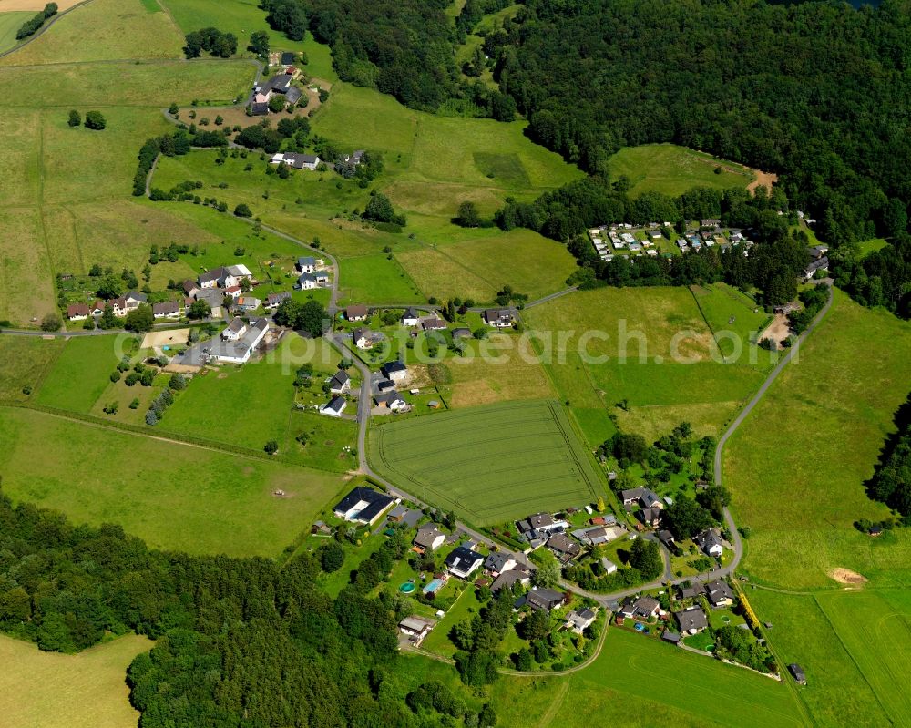 Aerial photograph Asbach - View of the Koettingen part of Asbach in the state of Rhineland-Palatinate. The borough and municipiality Asbach is located in the county district of Neuwied in the Niederwesterwald forest region between the Nature parks Rhine-Westerwald and Bergisches Land. Koettingen is a small hamlet in the East of the core village, which is - because of a camping site and the mill of Koettingen - also touristically informed