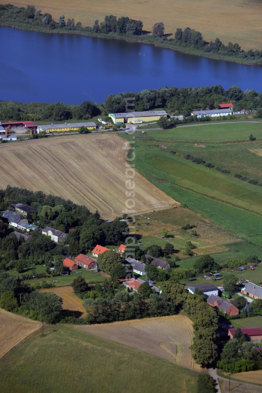 Hohen Wangelin from the bird's eye view: View of the Liepen part of the borough of Hohen Wangelin in the state of Mecklenburg - Western Pomerania. The agricultural village with the small estates and farms is located on the Eastern shore of the Lake Grosser Liepener See