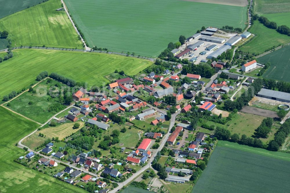 Aerial image Lindtorf - View of the Lindtorf part of the borough of Eichstedt (Altmark) in the state of Saxony-Anhalt. The borough is located in the county district of Stendal and is an agricultural borough. Lindtorf includes a large agricultural estate and is surrounded by fields and meadows