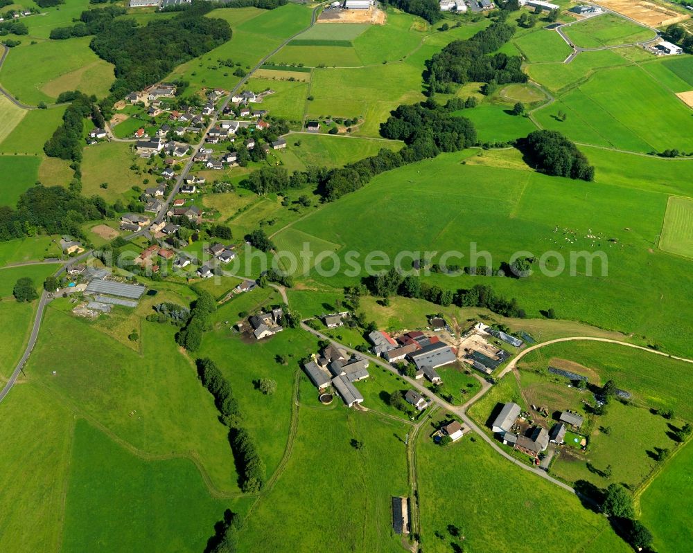 Buchholz from above - View of the Mendt part of Buchholz in the state of Rhineland-Palatinate. The borough and municipiality Buchholz is located in the county district of Neuwied on the edge of the Westerwald forest region and surrounded by fields, meadows and hills. Mendt is an agriculturally informed village and is located in the North of the core village