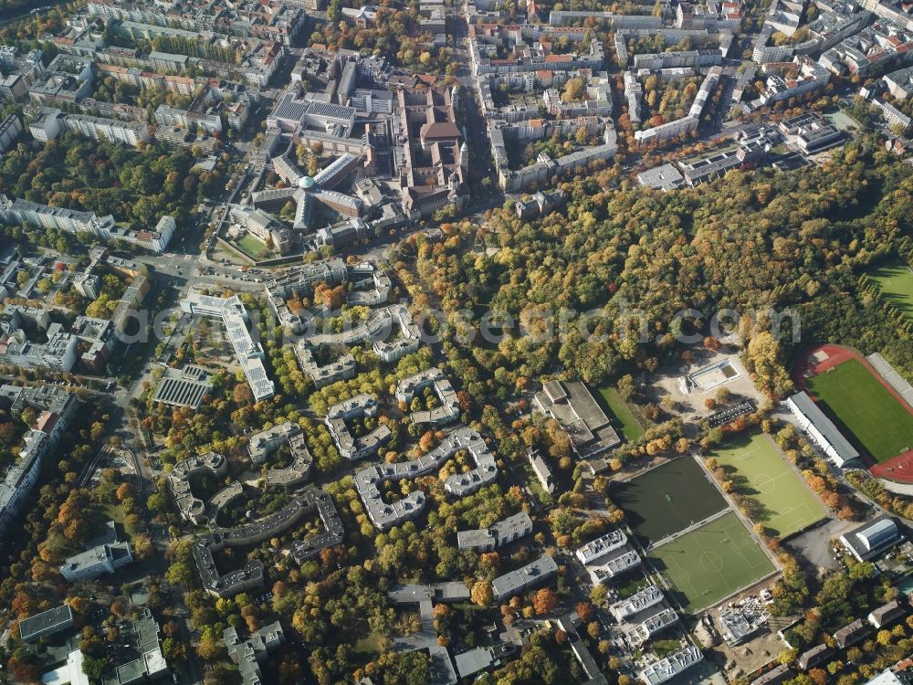 Berlin from above - View of the Moabit part of the district of Mitte in Berlin. The star shaped building is the Moabit Jail (JVA) wich was built in the 19th century and is listed as a protected building today. The court of Tiergarten is located next to it. Post stadium and several football facilities and pitches are located in the Fritz-Schloss Park