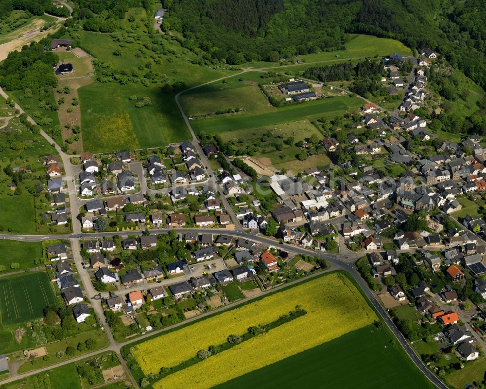 Aerial image Brohl-Lützing - View of the Niederluetzingen part of the borough of Brohl-Luetzing in the state of Rhineland-Palatinate. Niederluetzingen is located in the North of the borough, close to the federal highway 412. Its residential area is agriculturally informed and surrounded by fields and forest